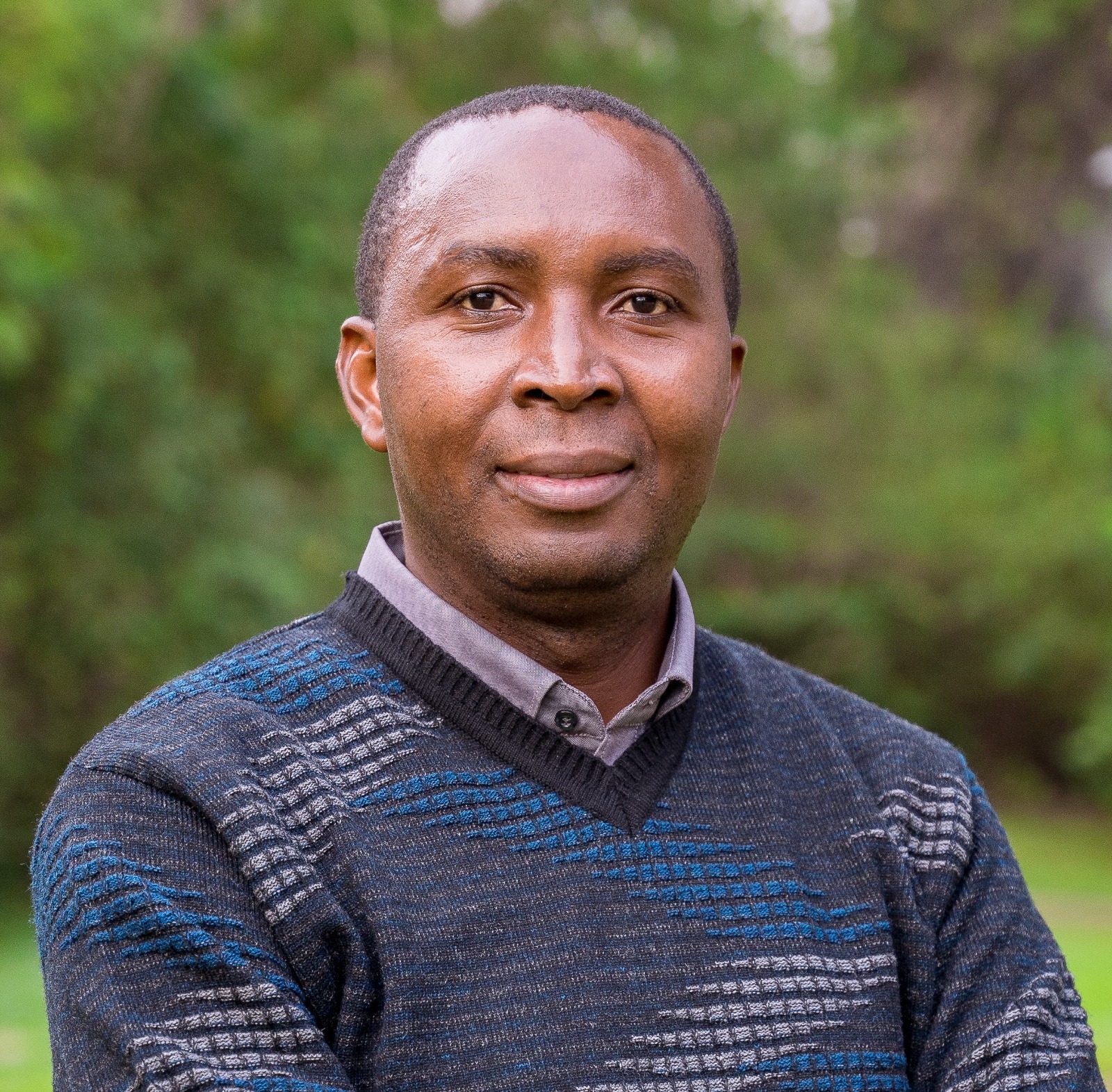 Dr. Lucian Ngeze